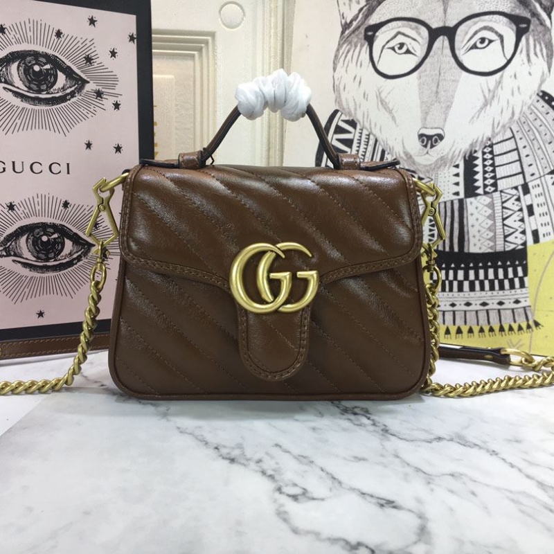 G*u*i top handle bags